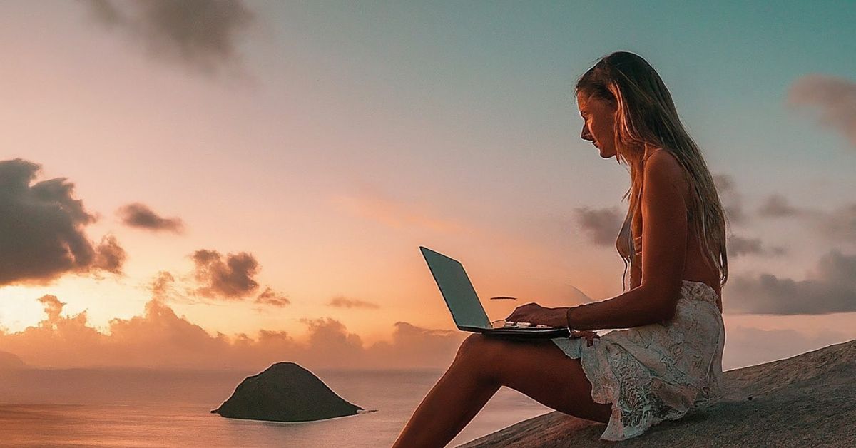 digital nomad working on a laptop